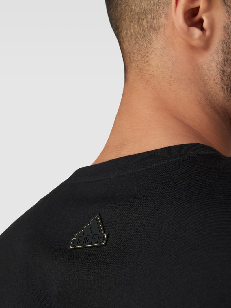 T-Shirt mit Logo-Print in schwarz