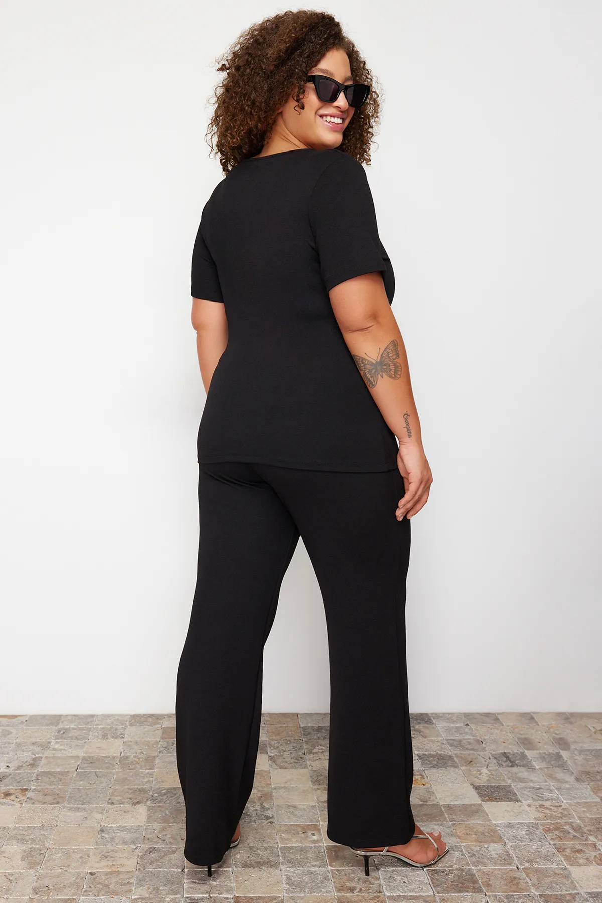 Trendyol Curve  Schwarzes Strickoberteil und Unterteil in großer Größe TBBSS24CP00007