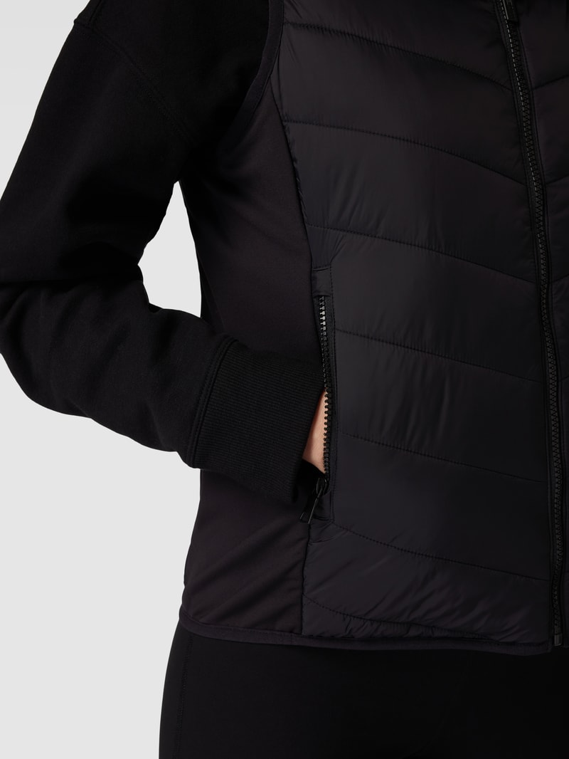 Steppweste mit Label-Patch Modell 'WET CIRE' in schwarz
