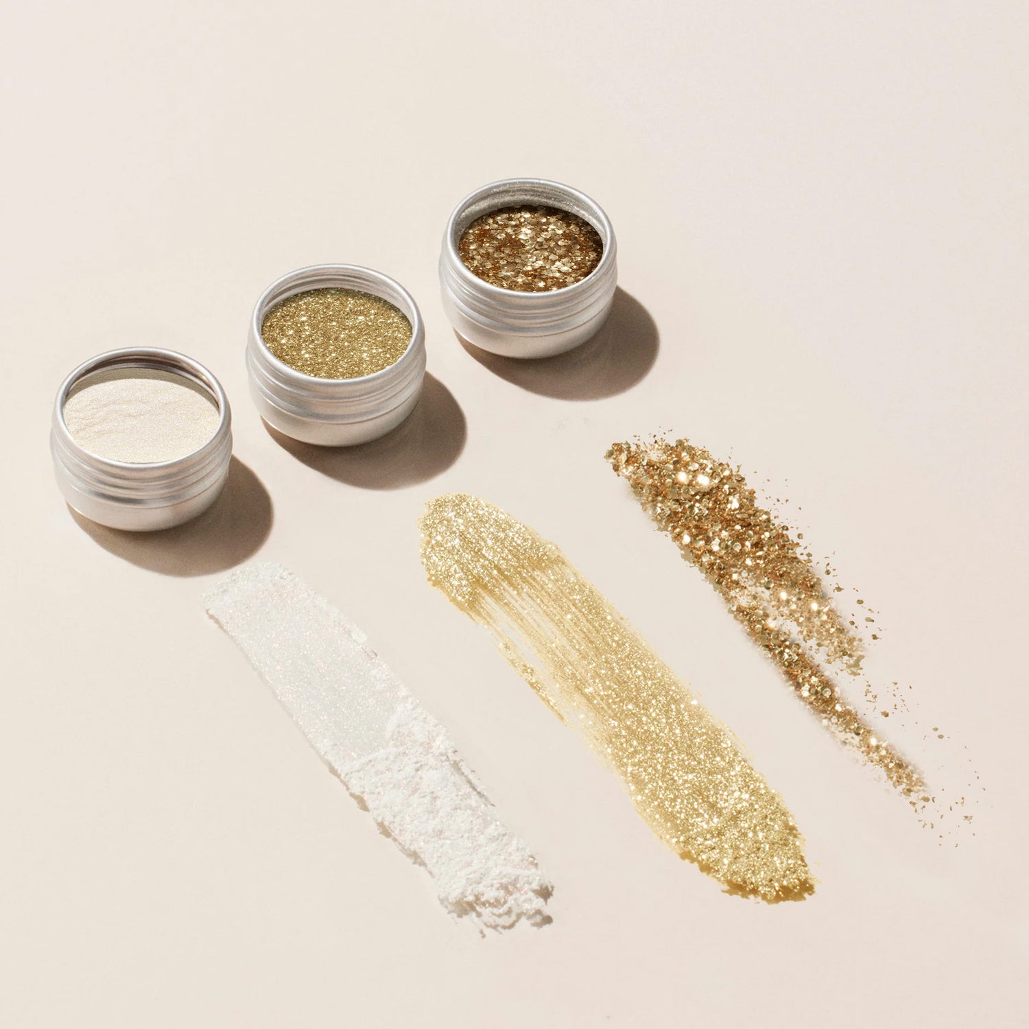 Trio di polveri glitterate ed effetto
