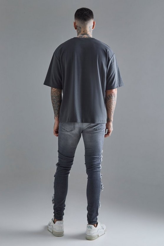 Tall Super Skinny PU Bikerjeans mit Rissen und Farbspritzern