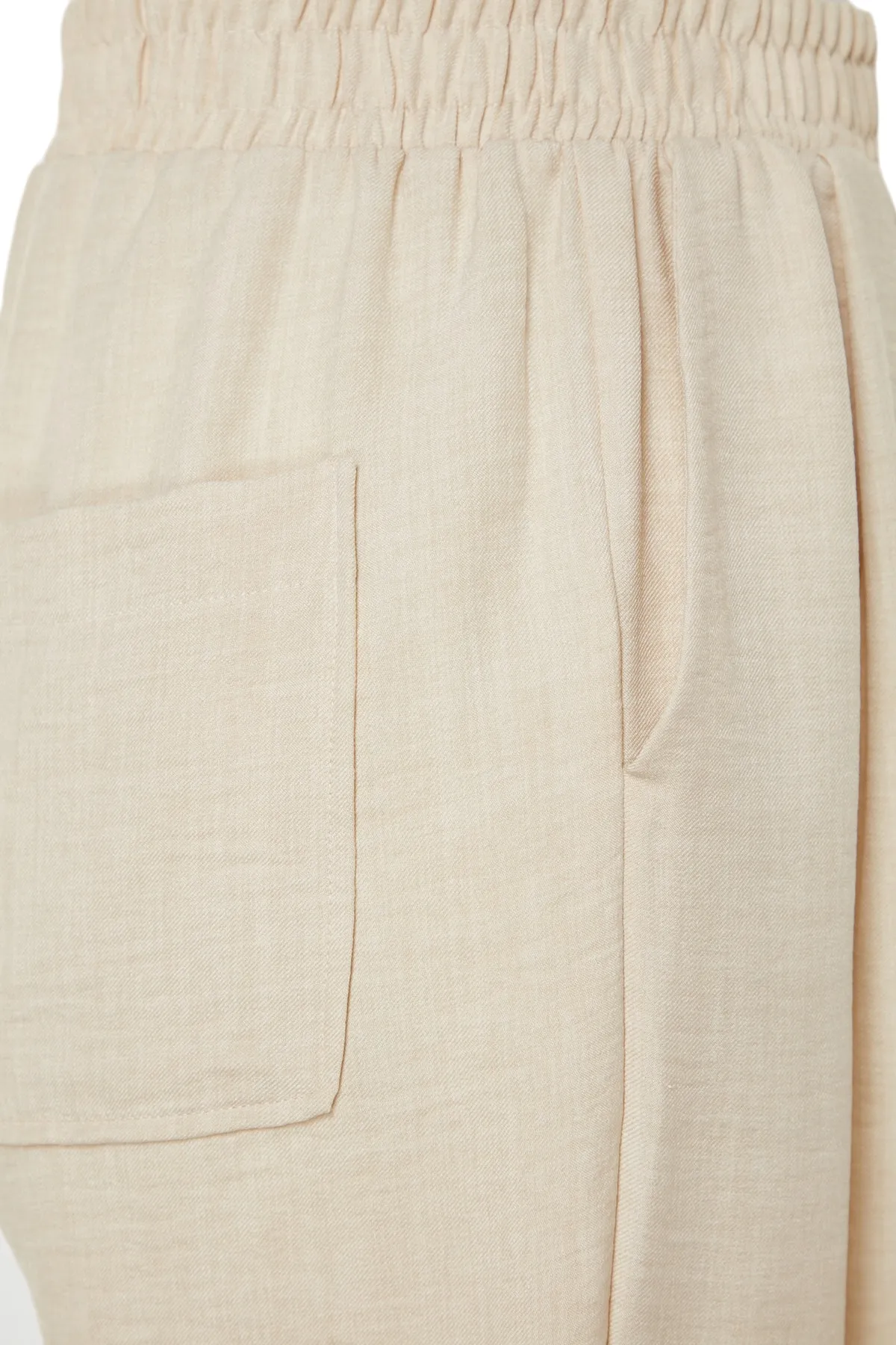 Trendyol Modest  X Kevser Sarıoğlu Beige gewebte Hose mit elastischem Bund TCLSS23TP00007