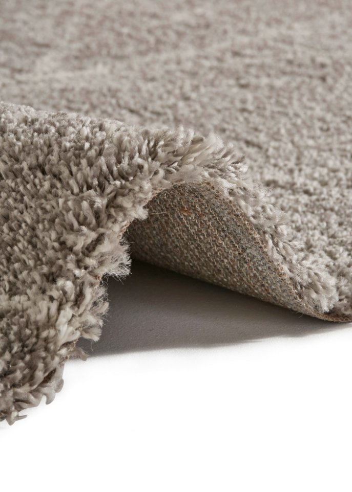 Hochflor Teppich mit floralen Motiven
