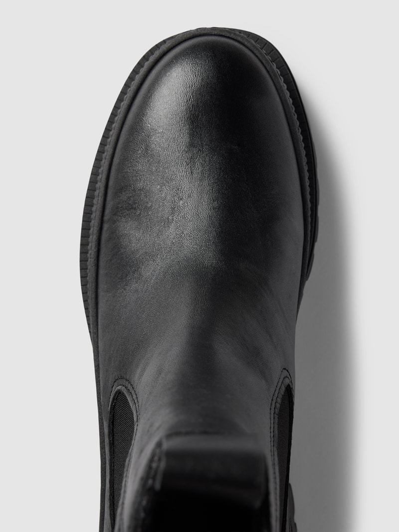 Boots aus Leder mit profilierter Sohle in schwarz