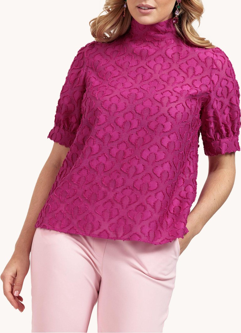 Top Alia de la Studio Anneloes, cu imprimeu jacquard și fundă la decolteu.
