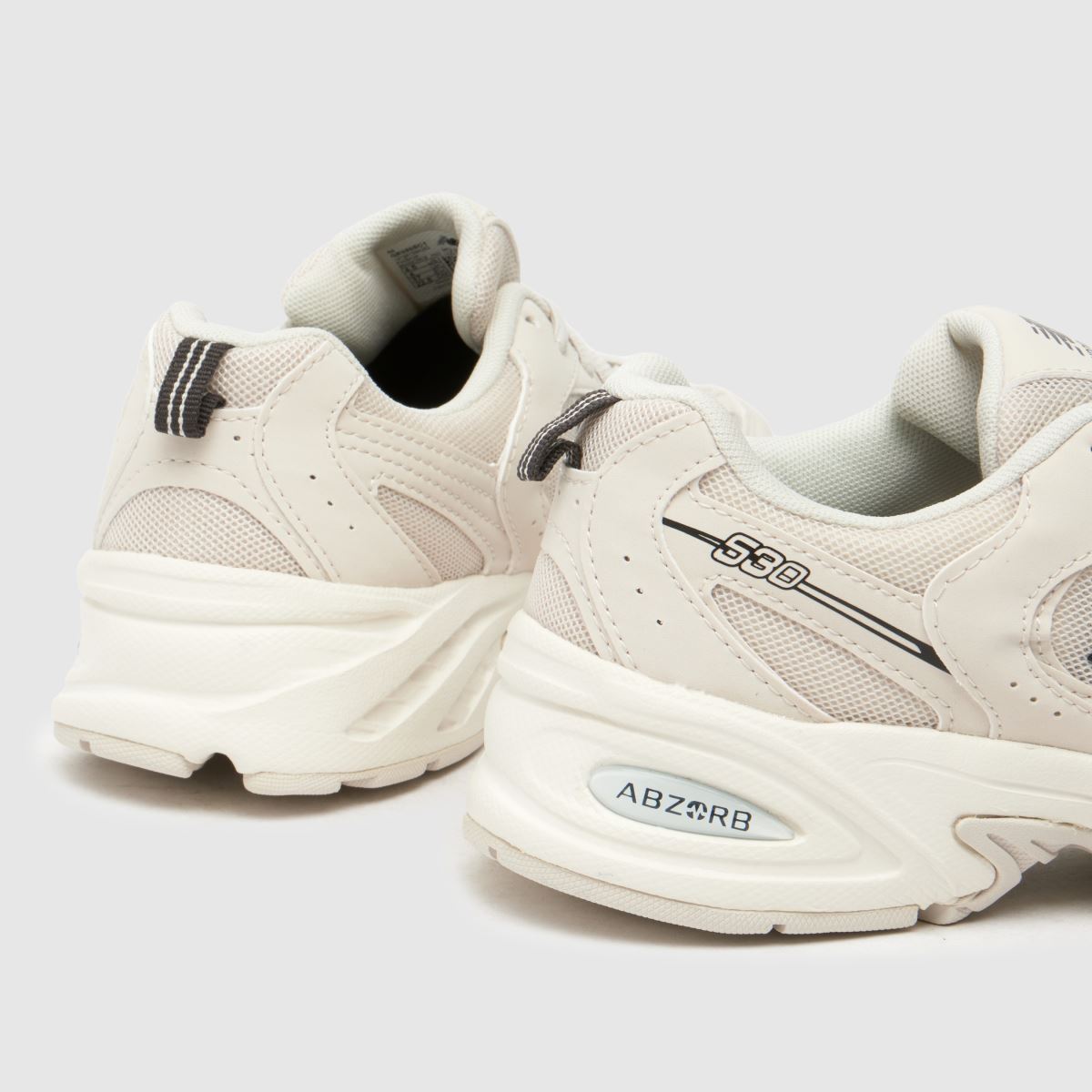 New Balance 530 Youth träningsskor i benvitt