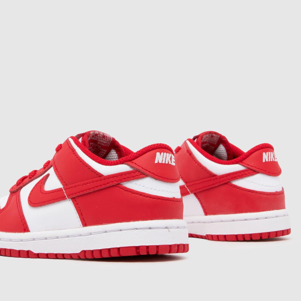Nike vita & röda Dunk Low pojkar småbarnsskor