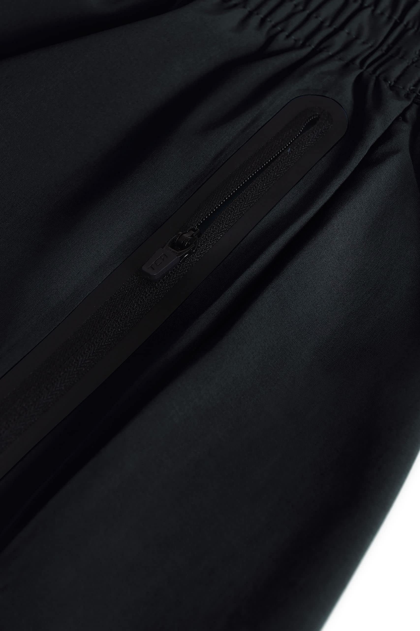 TCA 3/4-Hose TCA Herren Elite Tech Laufhose mit Reißverschlusstaschen - Schwarz, XS