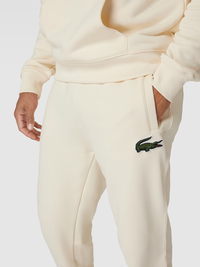 Sweatpants mit elastischen Abschlüssen in offwhite