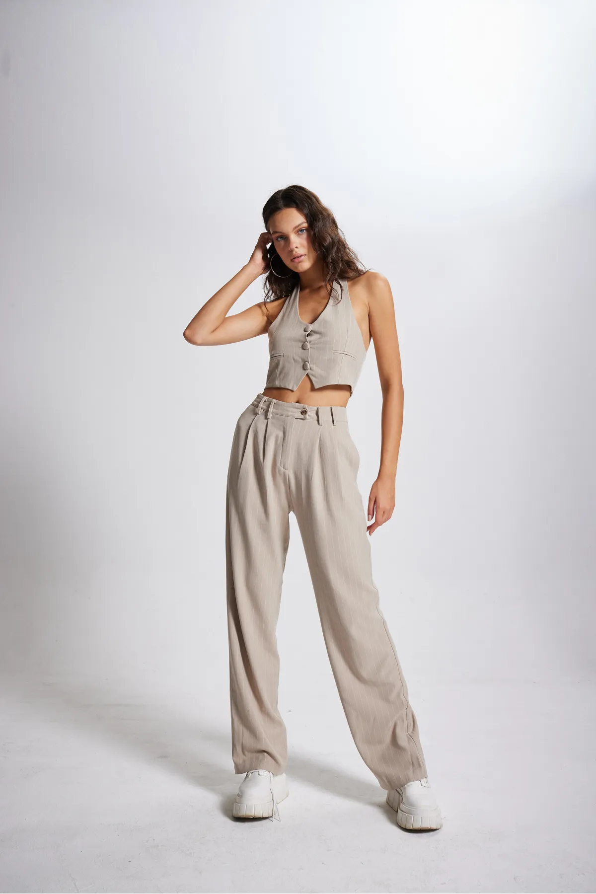 HOLLY LOLLY  Gestreifte Stoffhose mit hoher Taille in Beige