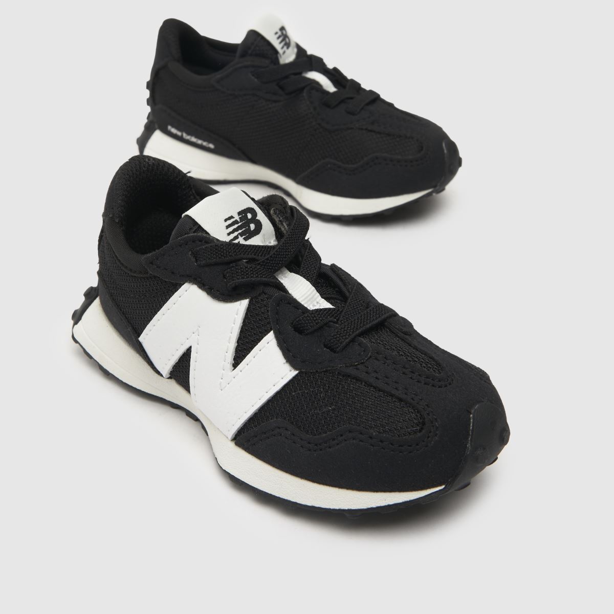 New Balance svarta och vita 327 småbarnsskor