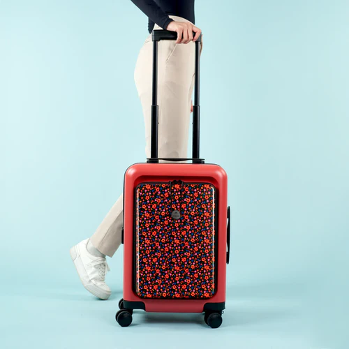 LHR 4-wheel hard-shell suitcase with orange MAD pouch