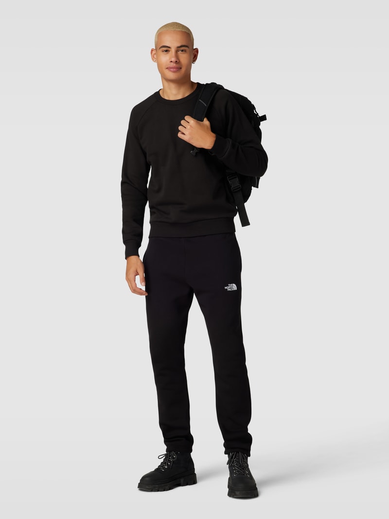 Sweatshirt mit Label-Print Modell 'RAGLAN' in schwarz