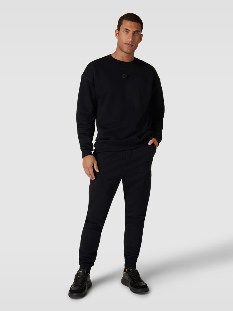Sweatpants mit Cargotasche Modell 'PEOVA' in schwarz
