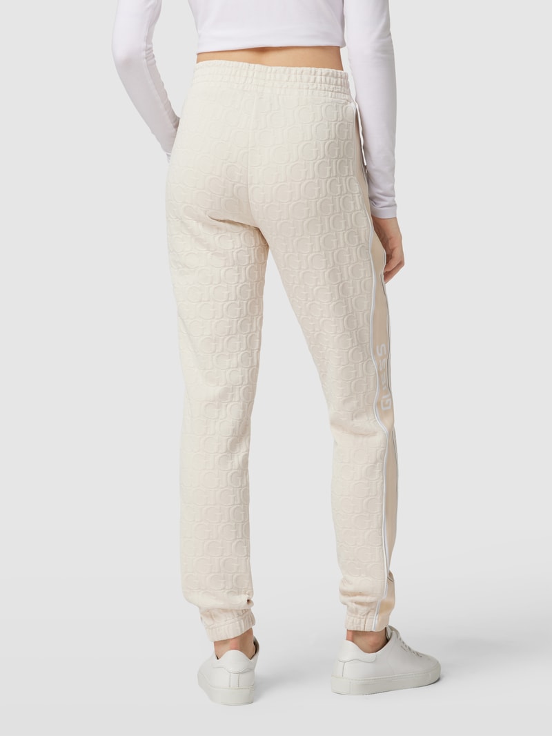 Sweatpants mit Allover-Logo Modell 'DARLA' in sand