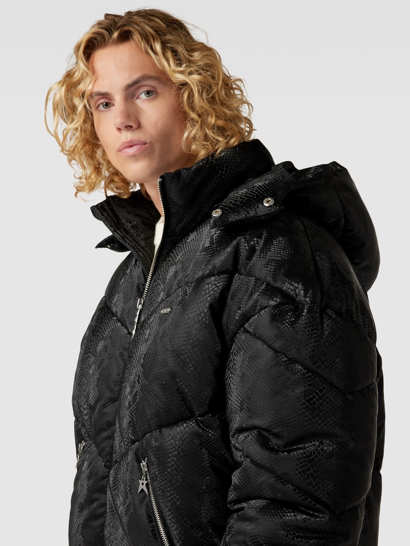 Steppjacke mit Schlangenmuster in schwarz