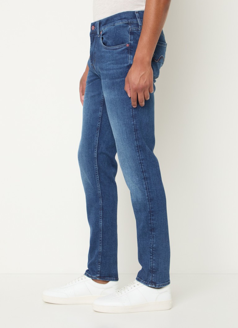 7 For All Mankind Slim fit džinsi ar vidēji biezu mazgāšanas dziļumu un sānu kabatām