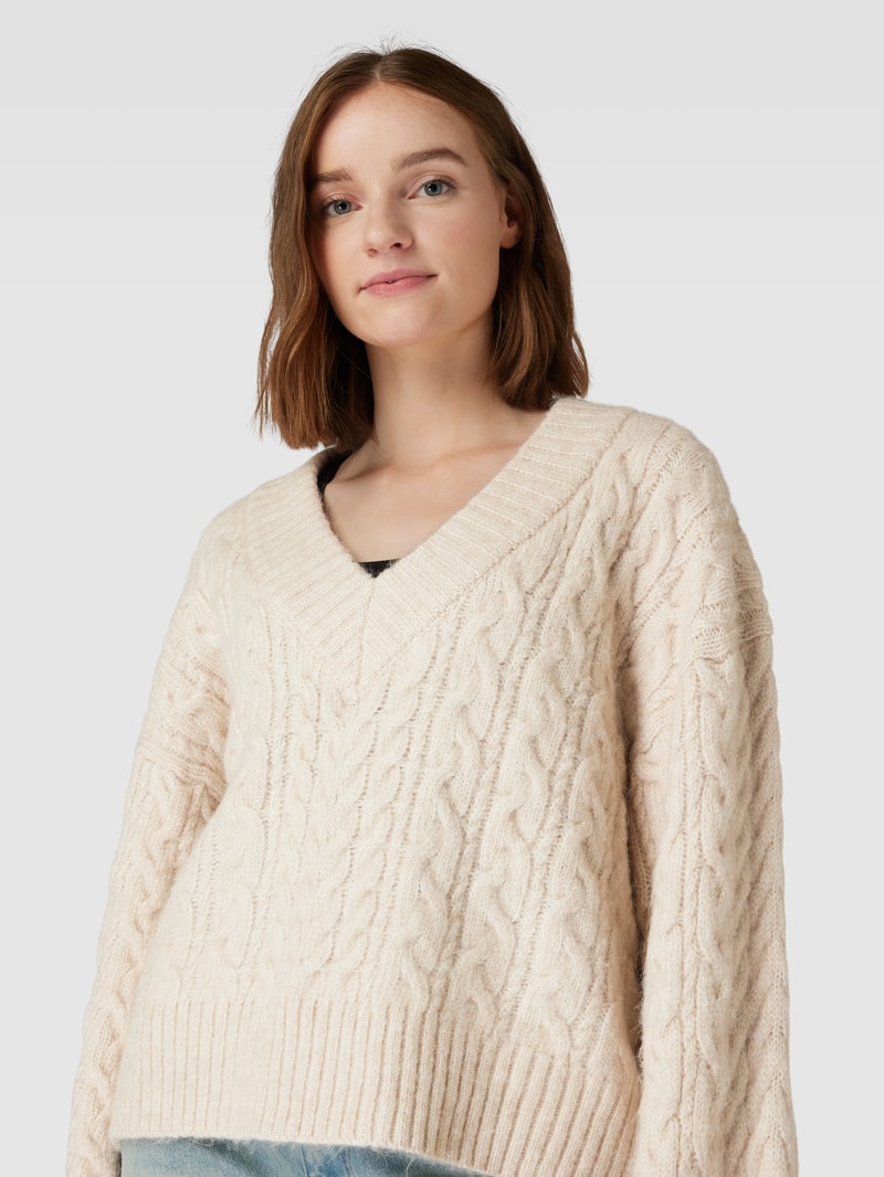 Strickpullover mit V-Ausschnitt in beige