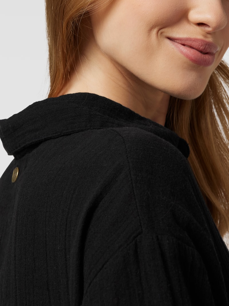 Playsuit mit Eingrifftaschen in schwarz