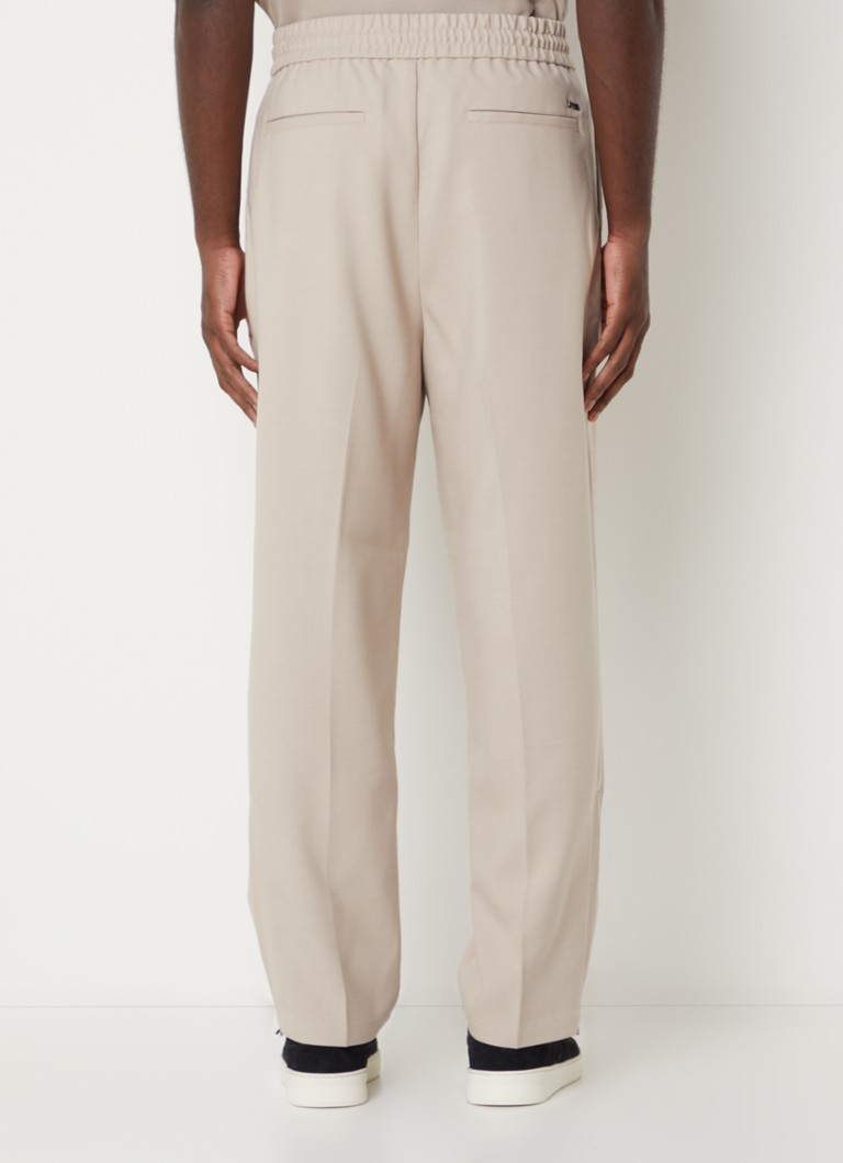 Pantaloni chino Emporio Armani, croială lejeră, din amestec de lână, cu buzunare interioare.