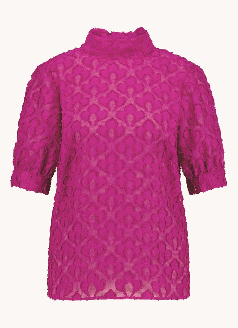 Top Alia de la Studio Anneloes, cu imprimeu jacquard și fundă la decolteu.