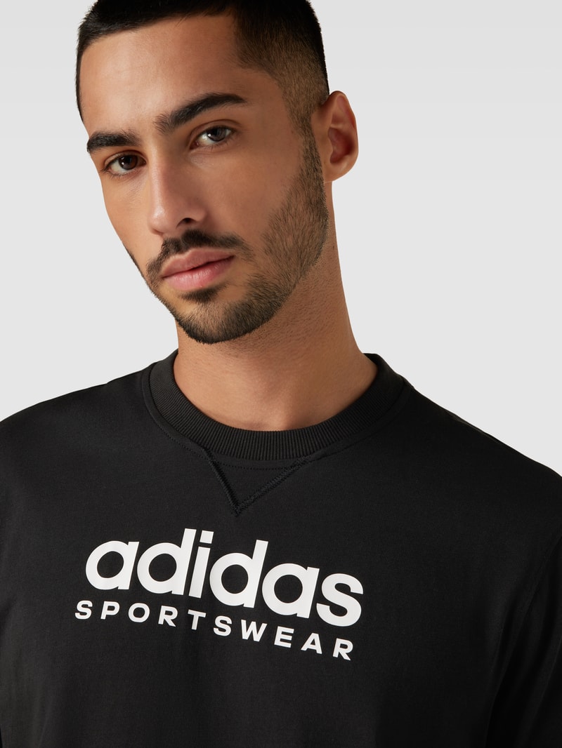T-Shirt mit Label-Print in schwarz