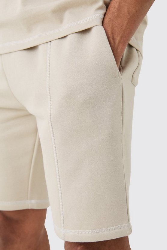 Lockere bestickte Shorts mit Kontrast-Naht