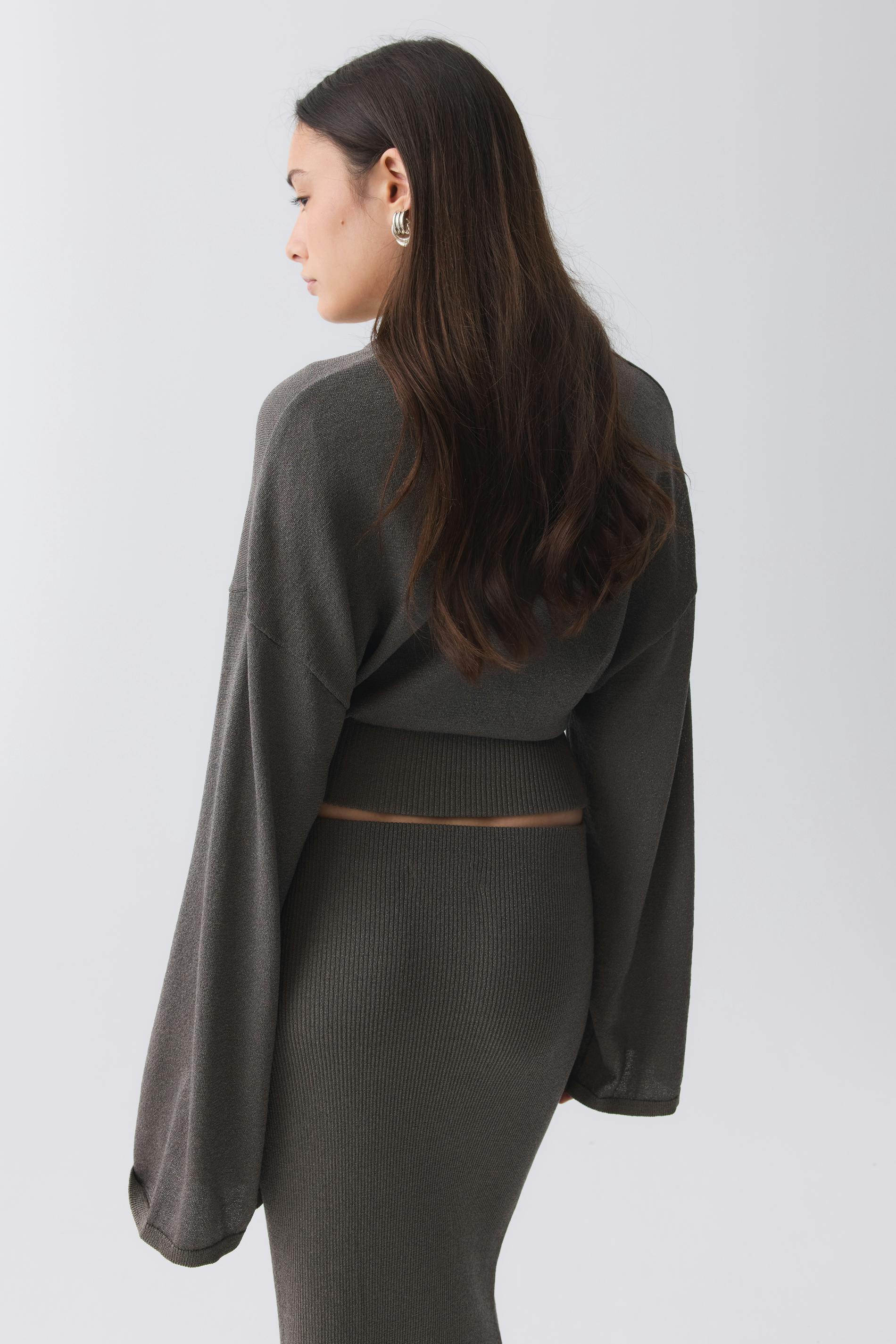 Knitted metallic top