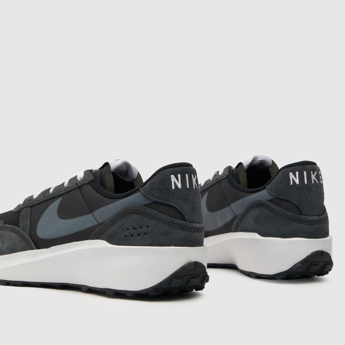Nike – Svarta och vita våffeldebutsneakers