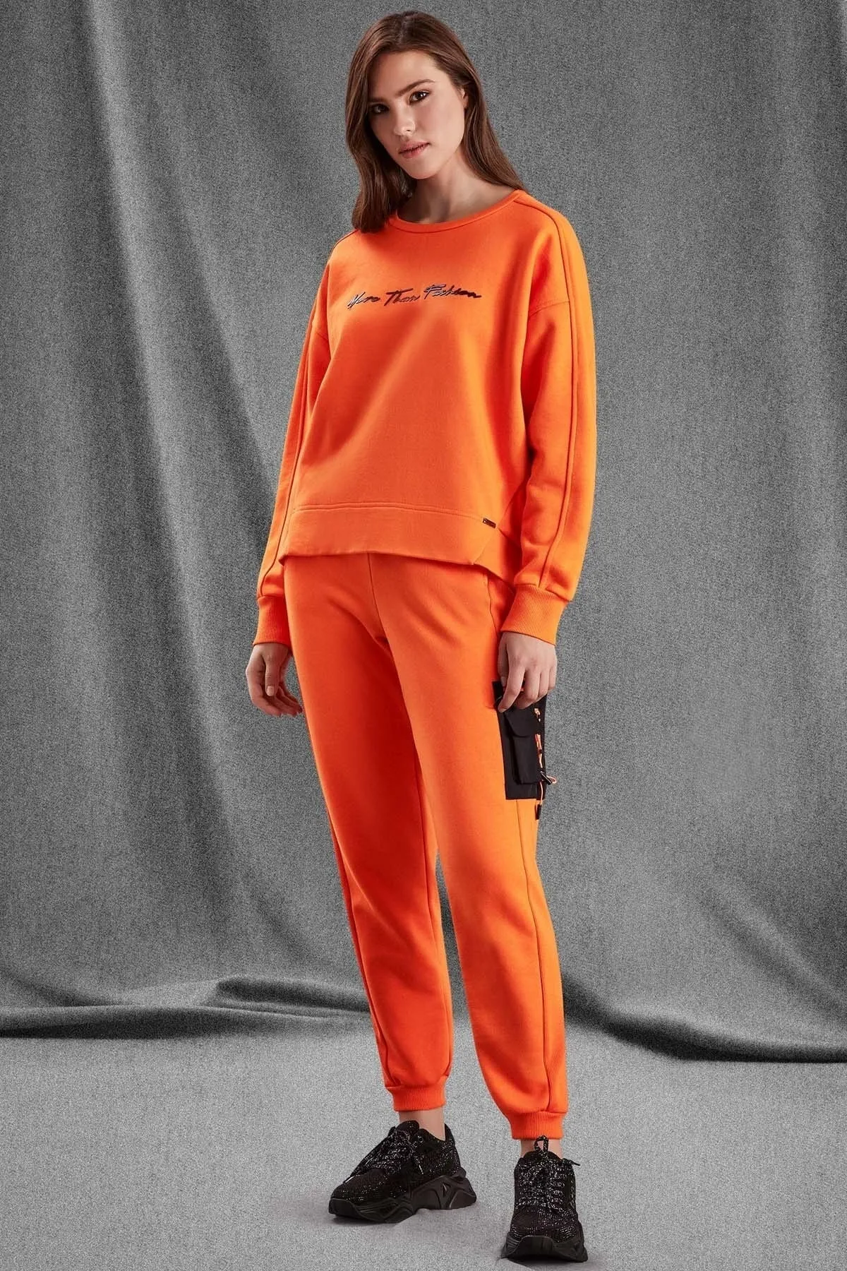 Guitar  Gestrickte Jogginghose in Zigarettenorange