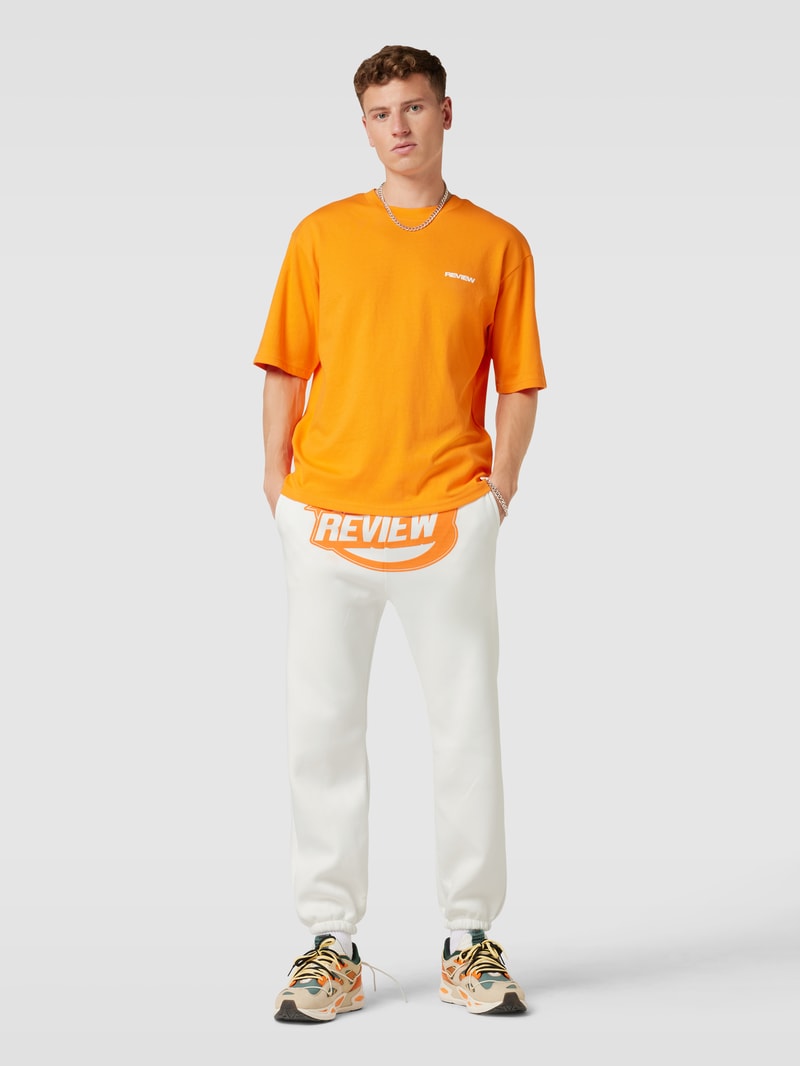 Sweatpants mit Label-Print in offwhite