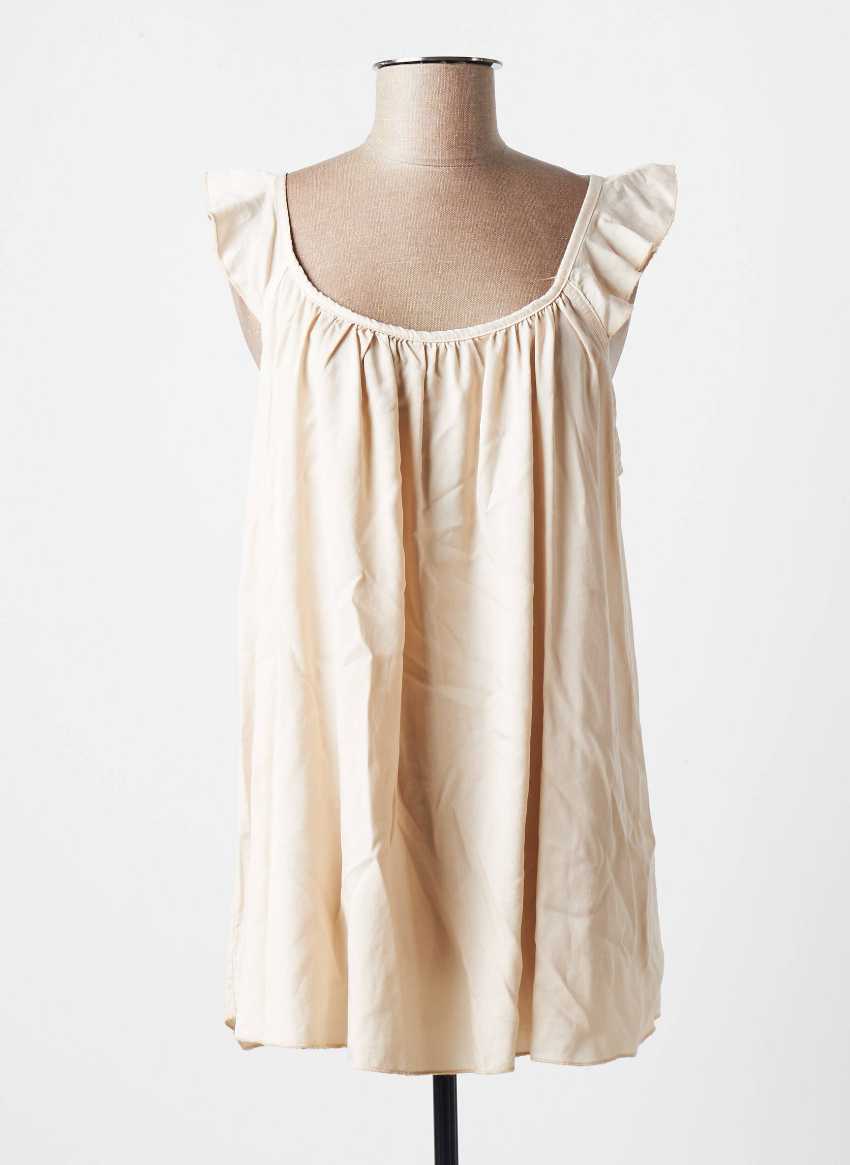 In April 1986 Tuniquemanchecourte Femme couleur beige