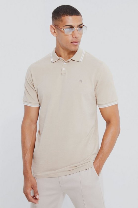 Pique Poloshirt mit Kronen-Stickerei