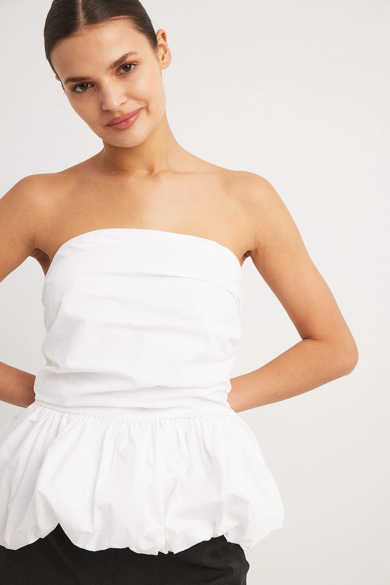 Schulterfreies Peplum-Oberteil