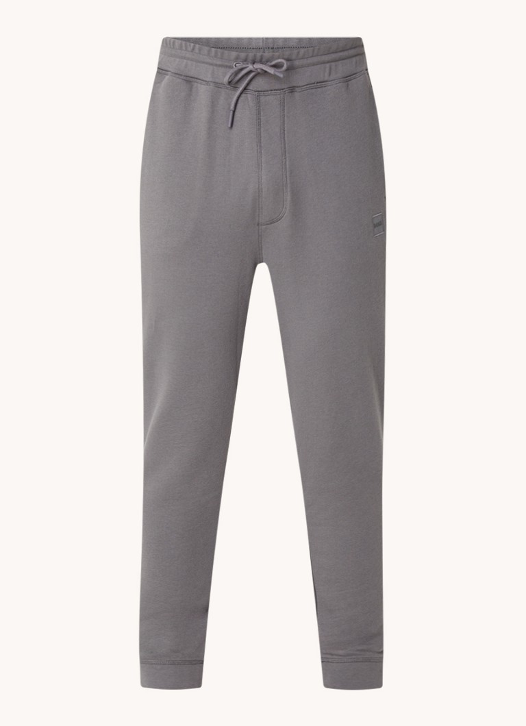 Pantaloni de trening slim fit de la HUGO BOSS, cu logo și buzunare laterale.
