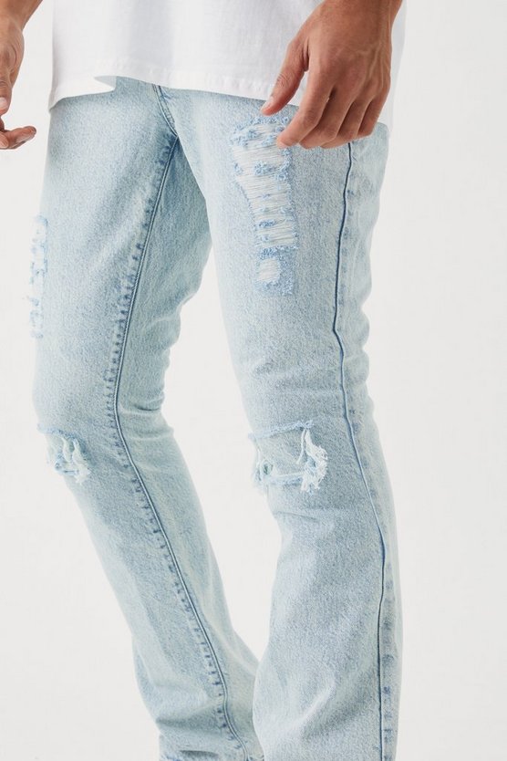 Slim-Fit Schlagjeans mit Rissen