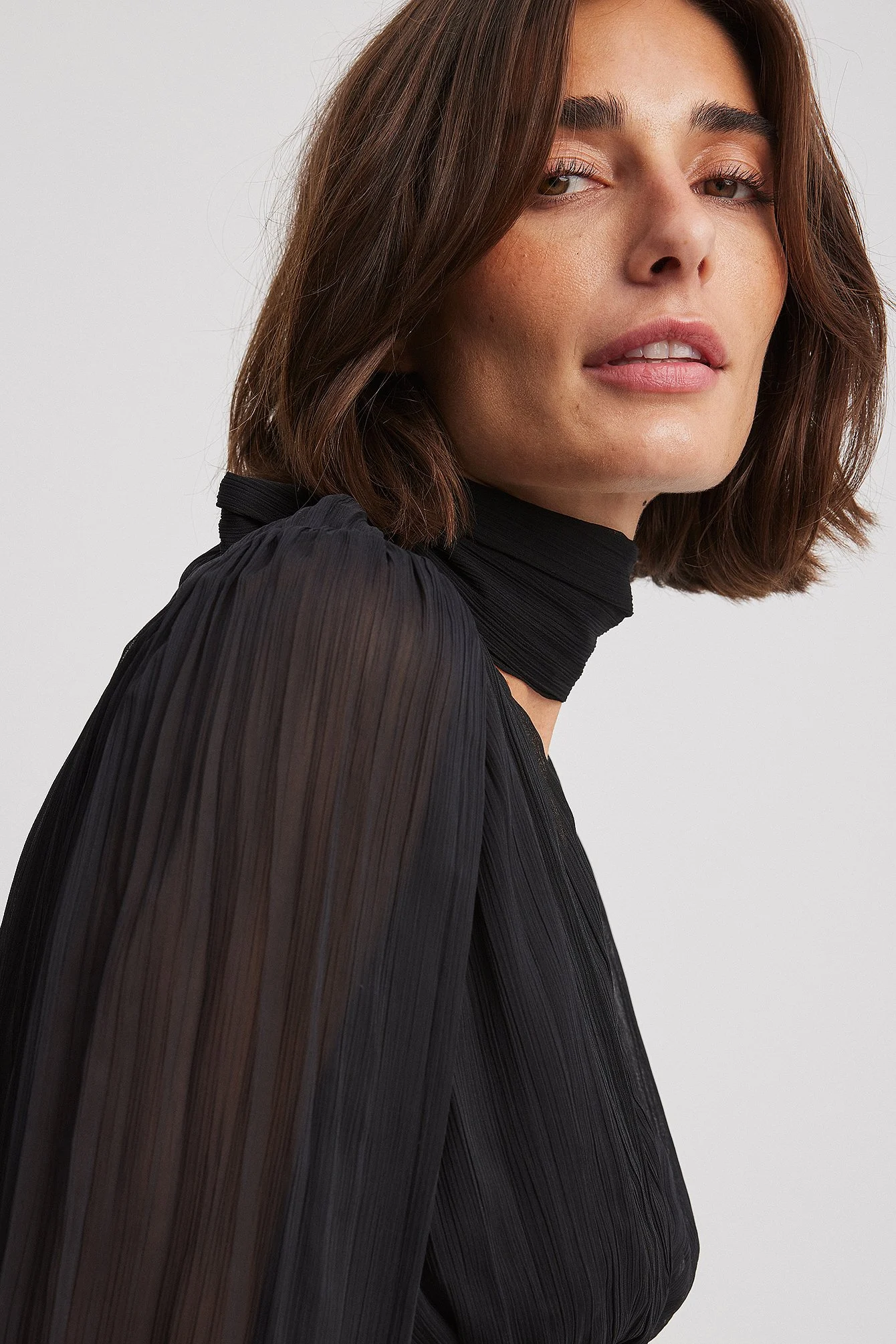Bluse mit Ballonärmeln und Plissee-Detail