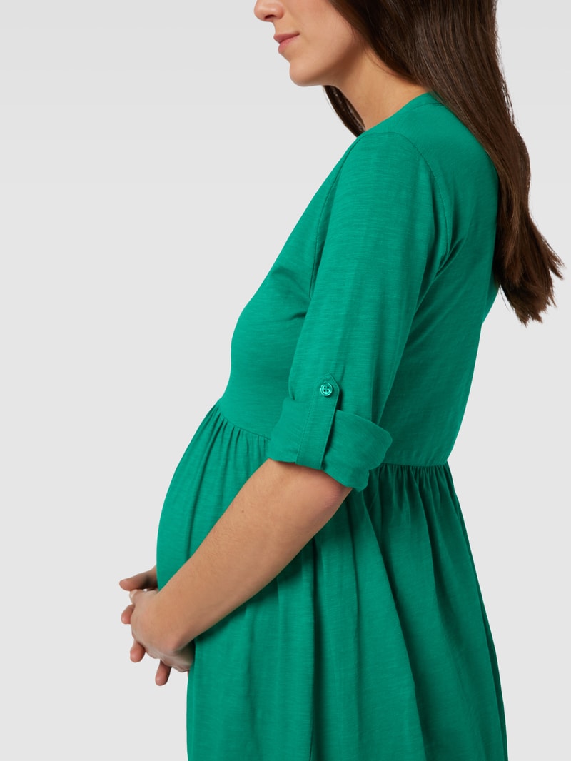 Knielanges Umstands-Kleid mit V-Ausschnitt in grün
