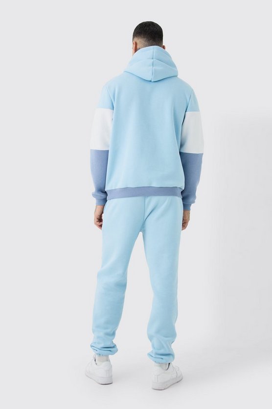 Tall hellblauer Colorblock Man Trainingsanzug mit Kapuze