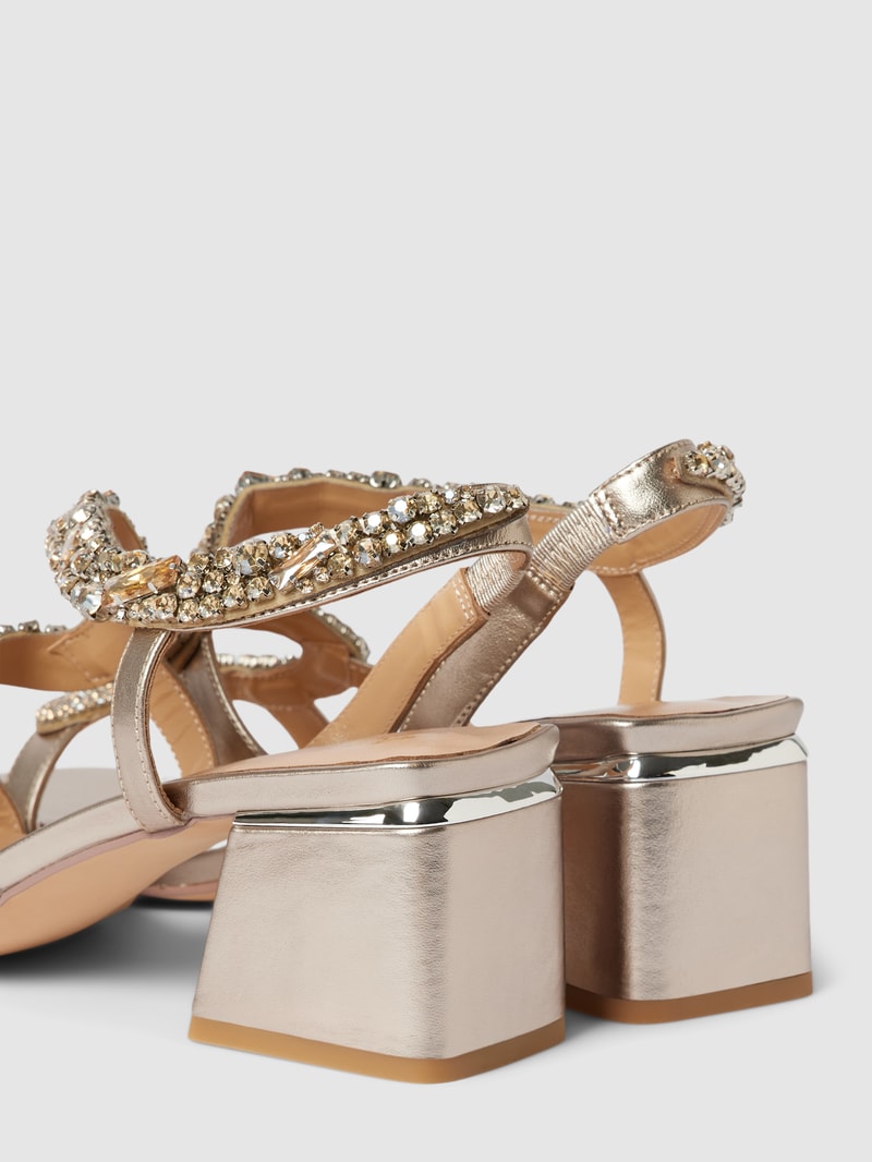 Sandaletten mit Ziersteinbesatz Modell 'Snake' in gold