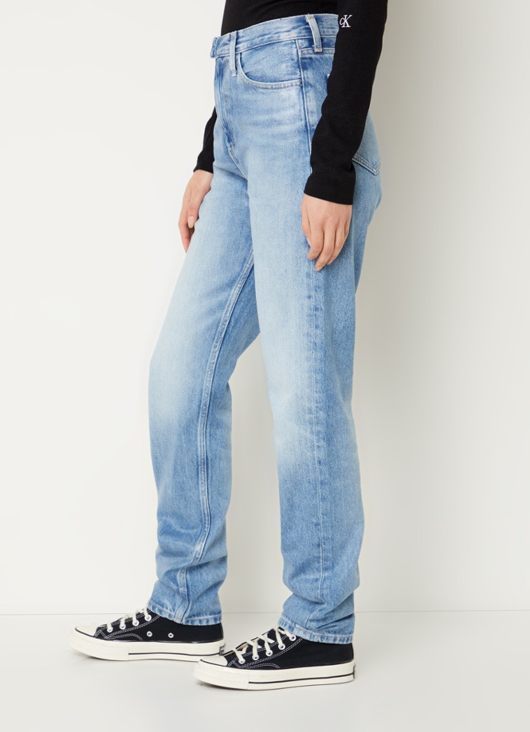 Calvin Klein high-waist slim-fit jeans with a medium wash
