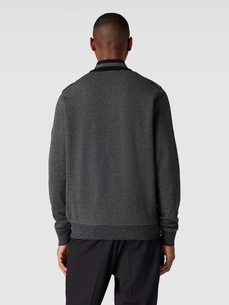 Sweatjacke mit Stehkragen und Reißverschlusstaschen in anthrazit