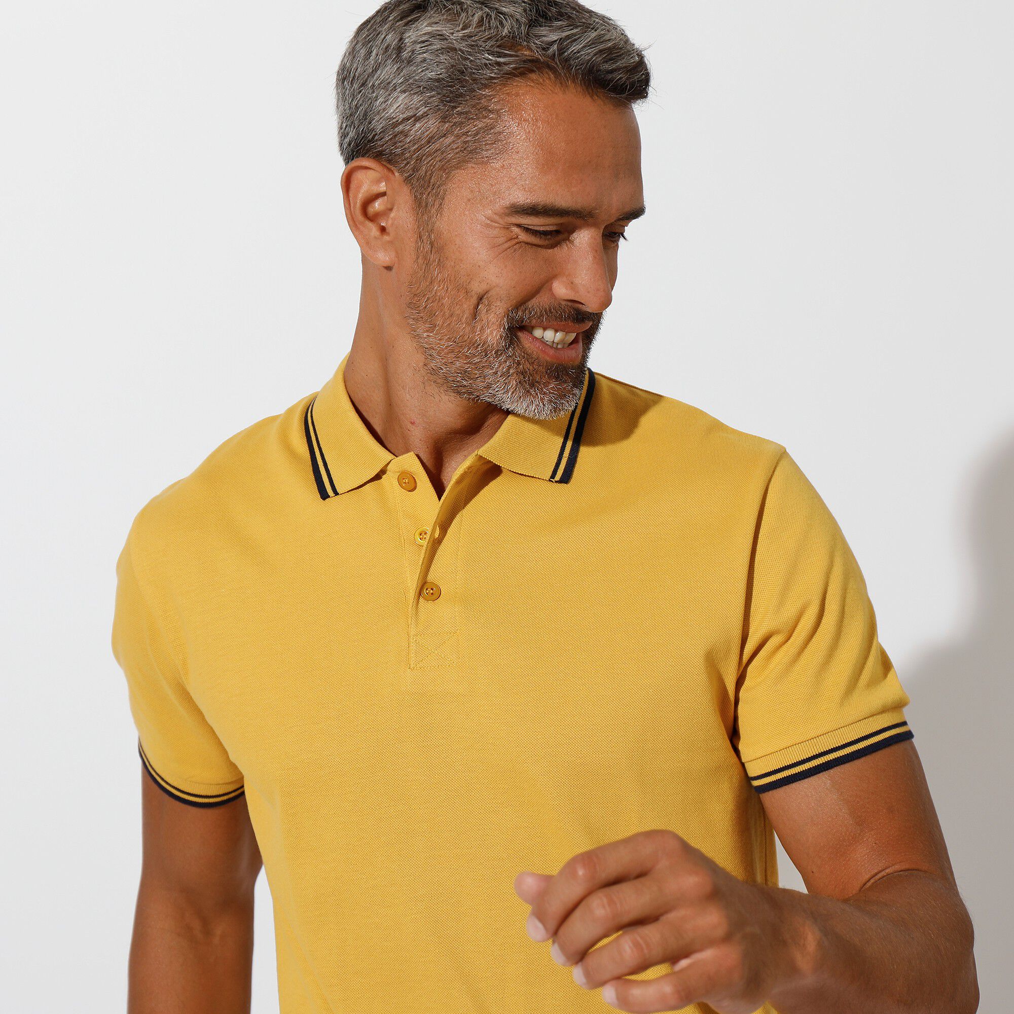 Polo uni maille piquée manches courtes