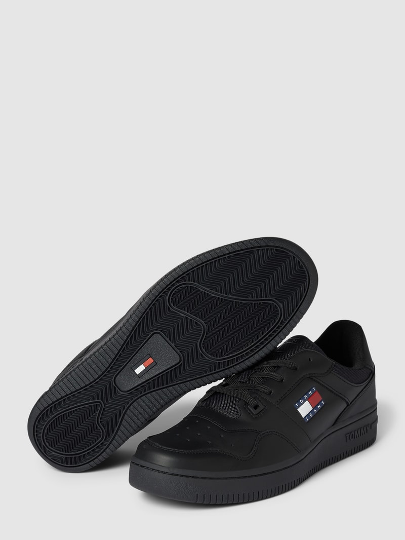 Sneaker aus Leder-Mix in schwarz