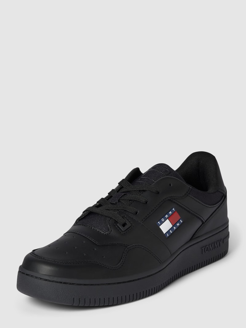 Sneaker aus Leder-Mix in schwarz