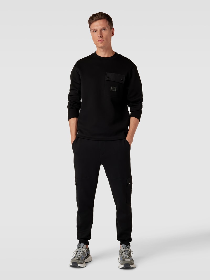 Sweatshirt mit Brusttasche Modell 'Dhaluli' in schwarz
