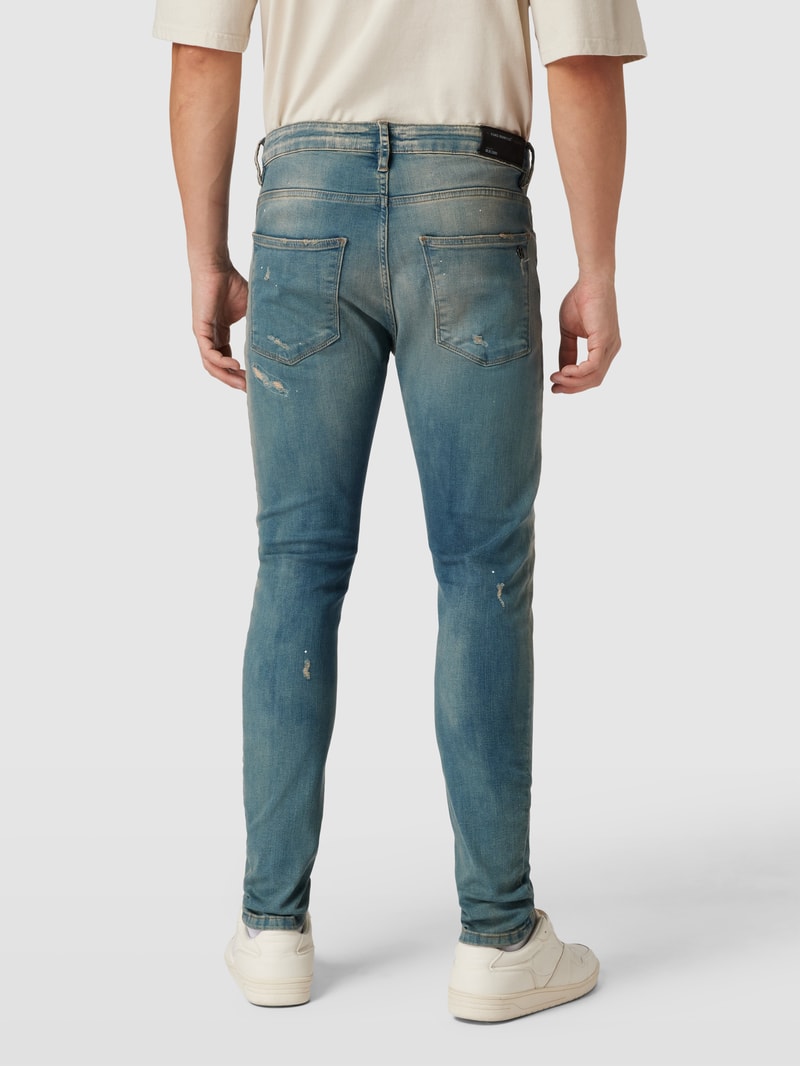 Tapered Fit Jeans im Destroyed-Look Modell 'Noel' in hellblau