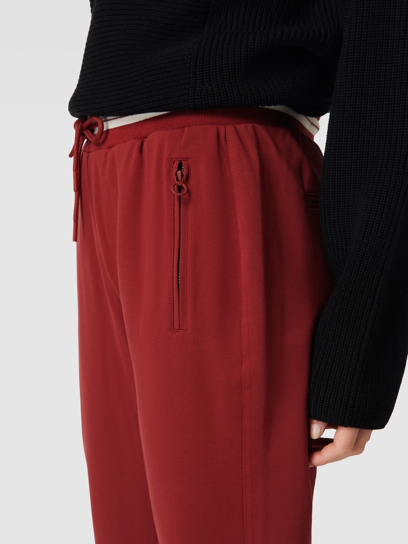Sweatpants mit Kontraststreifen in bordeaux rot