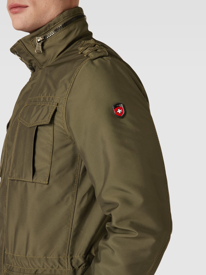 Funktionsjacke mit Stehkragen in olivgrün