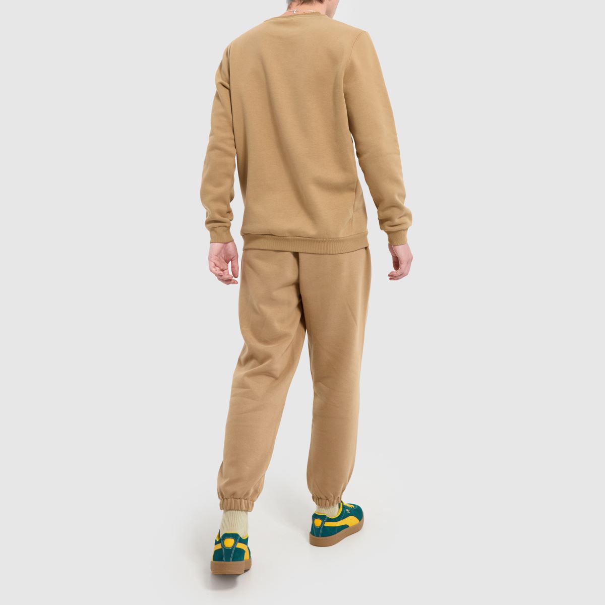 PUMA feel good melegítőruha bézs színben